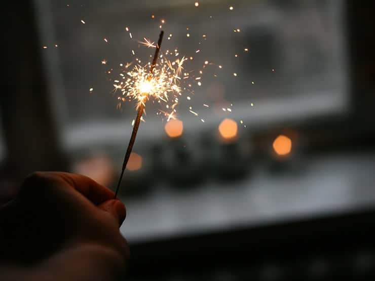 sparkler window danil aksenov unsplash